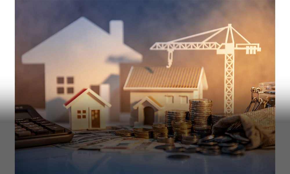 The image shows houses a construction crane and coins.