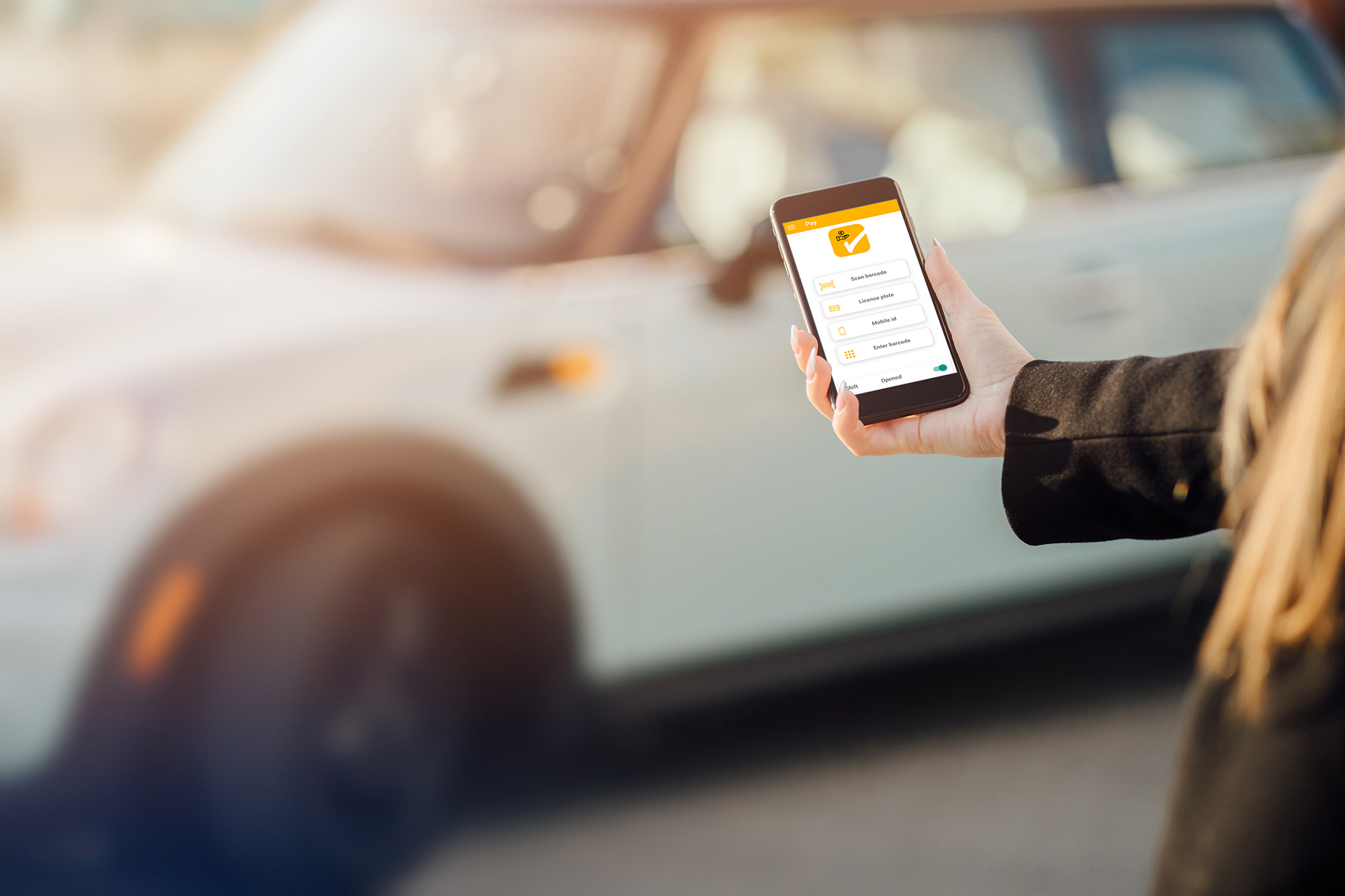 Smart Parking Picture Person with Smartphone in front of Car